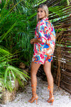 Multicolor print short set with blues, white, tan, orange, and red , short sleeve collar top